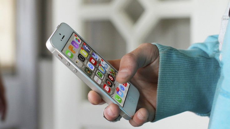 Holding iPhone 4s